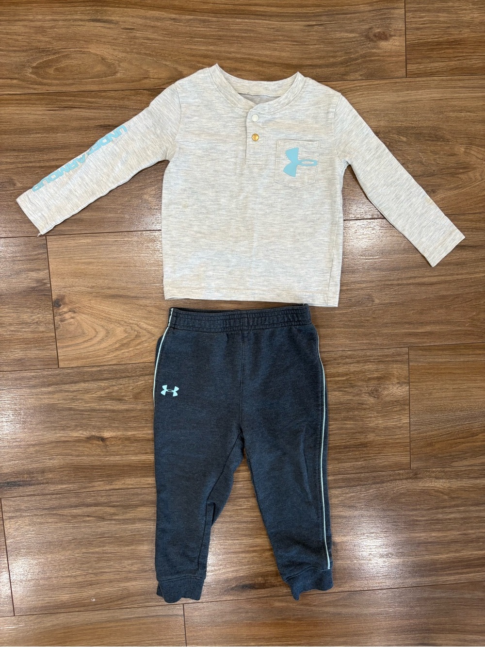 Under Armour Kids Black Heather Joggers with Light Blue Logo